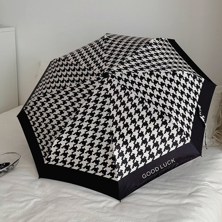 Women Folding Umbrella with Modern Wave Pattern Bowlift