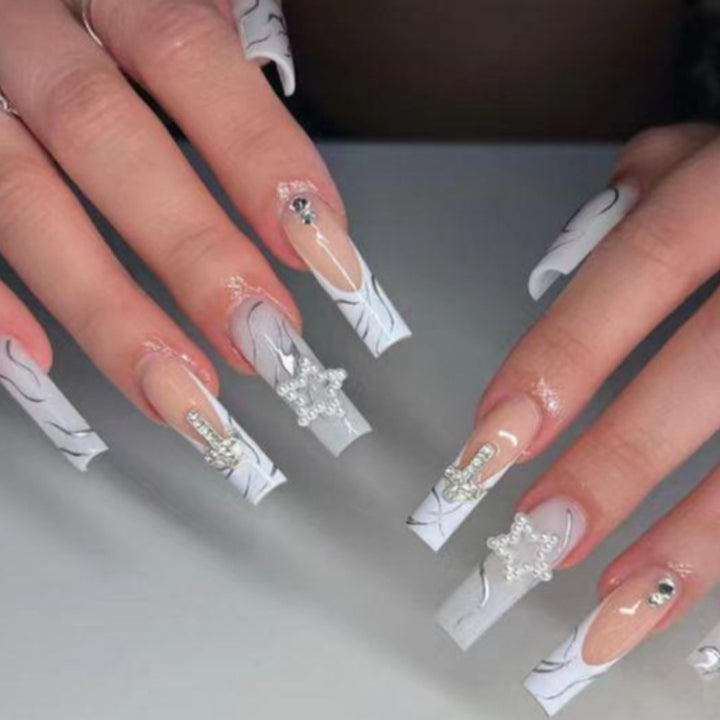 Stylish Long Acrylic Nail Extensions with Gem Accents Bowlift