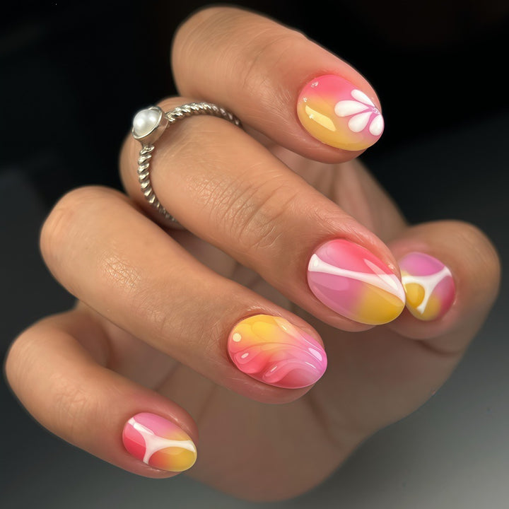 Artificial nails with floral design and elegant color gradients Bowlift