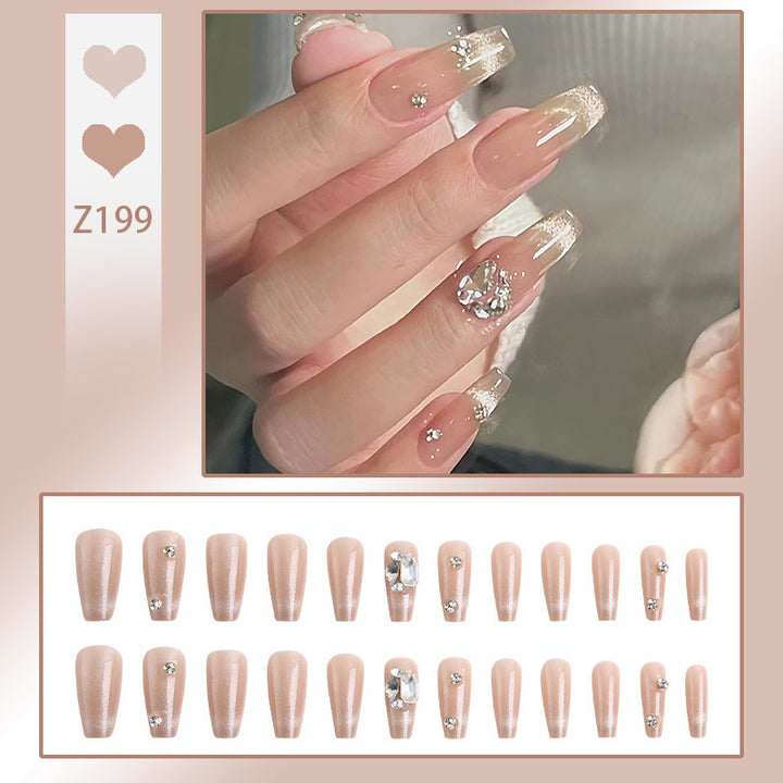 Acrylic nail set with glamorous glitter accents and elegant jewelry embellishments Bowlift