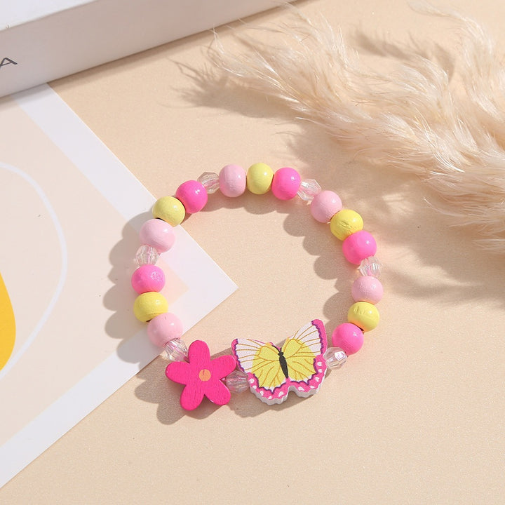 Playful bracelet with heart and butterfly charms Bowlift