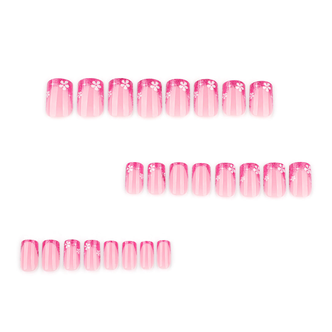 Artistic nail art with floral accent and glitter Bowlift