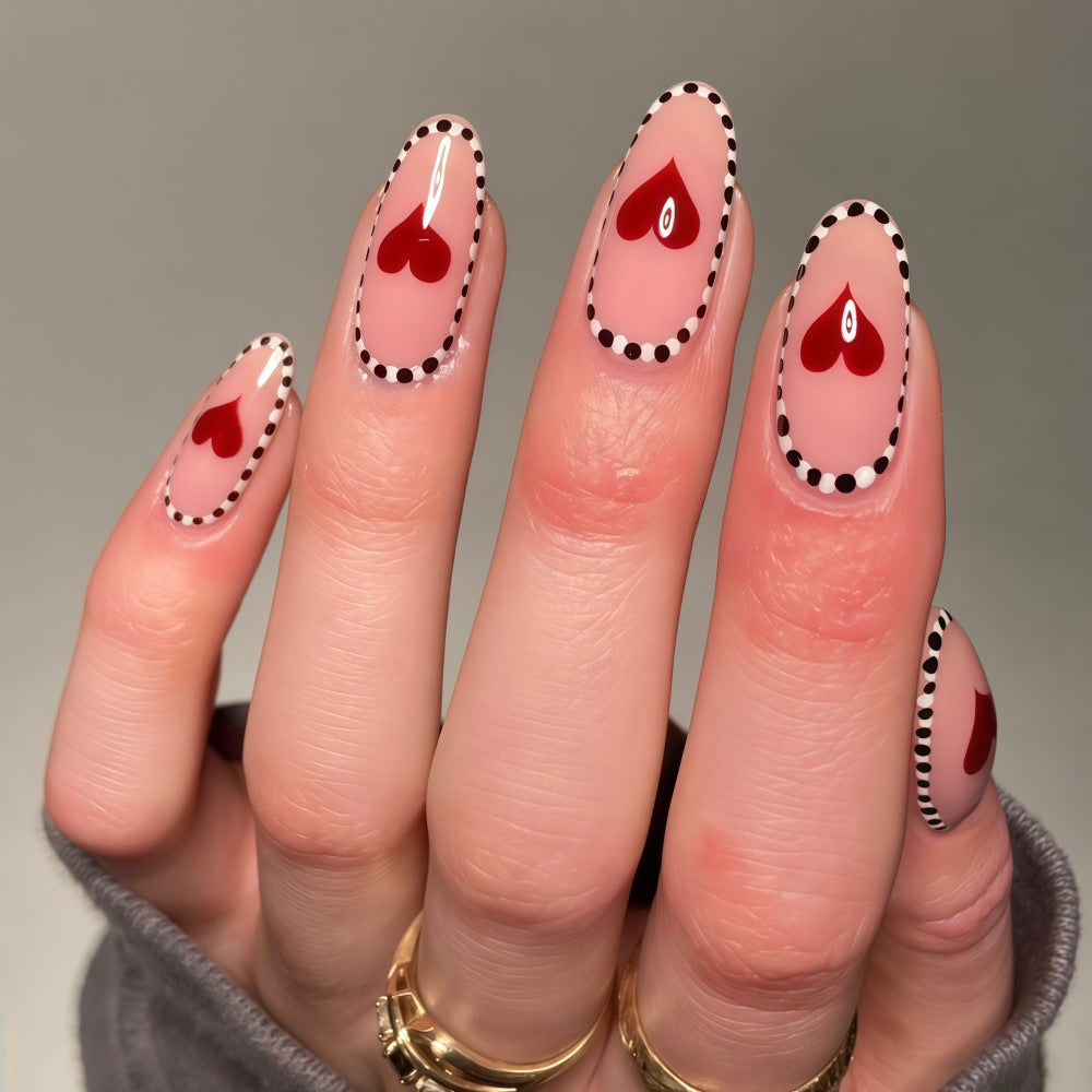 Artificial nails with heart-shaped accents Bowlift