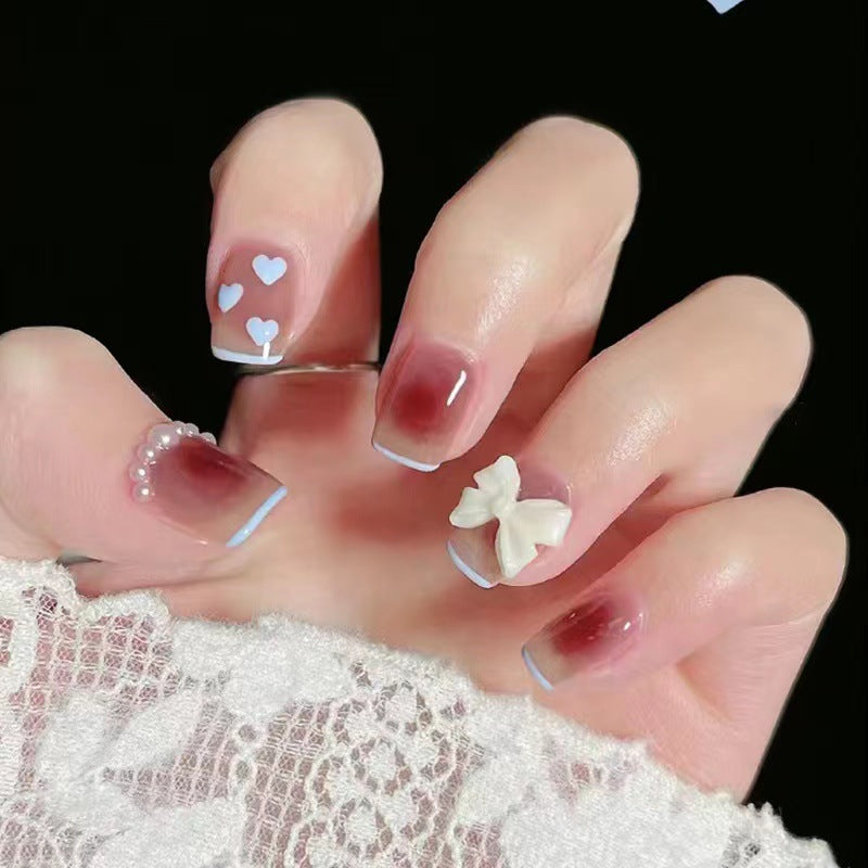 Artistic and elegant nail art with bow accents Bowlift