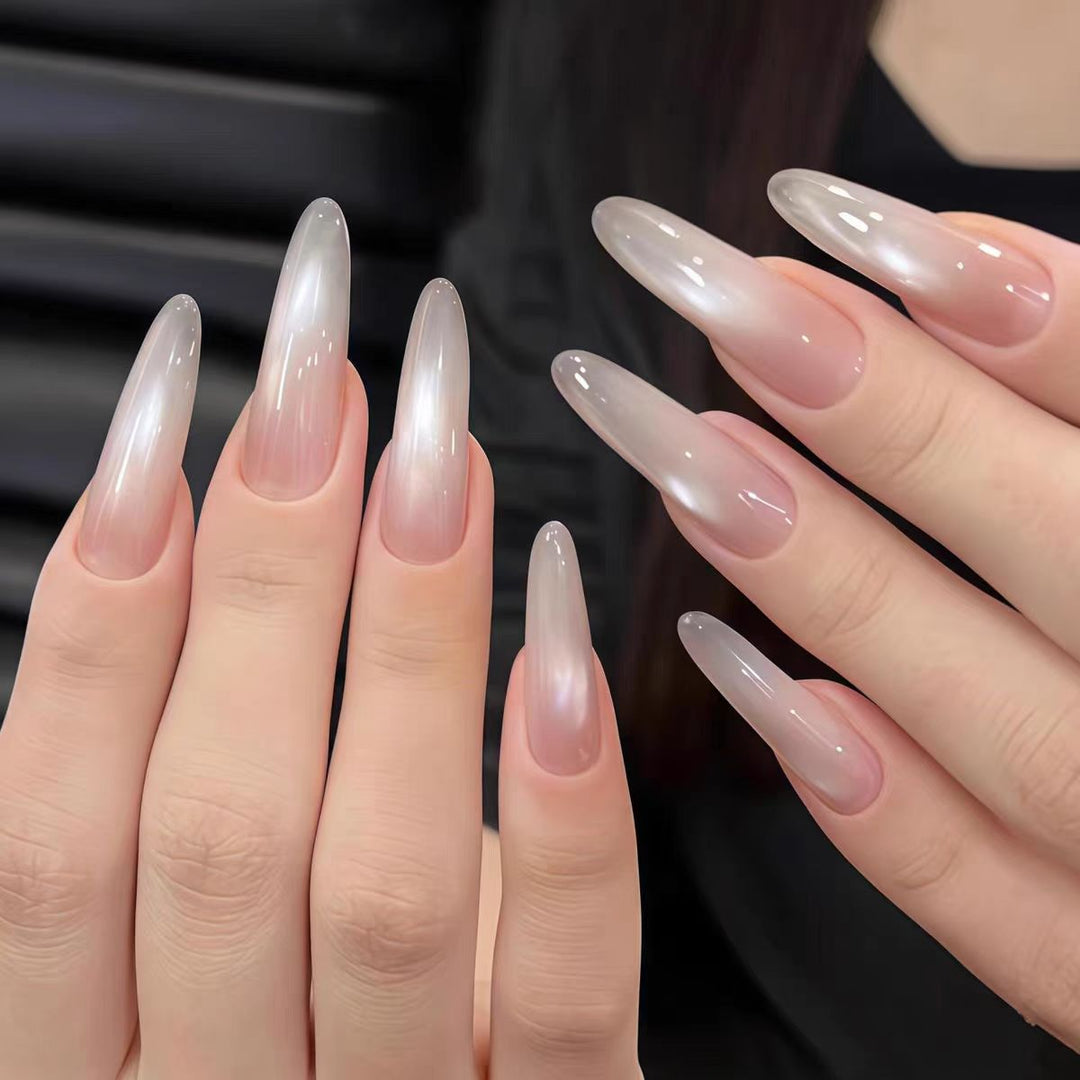 Artificial nails with elegant ombre effect and glitter coating Bowlift