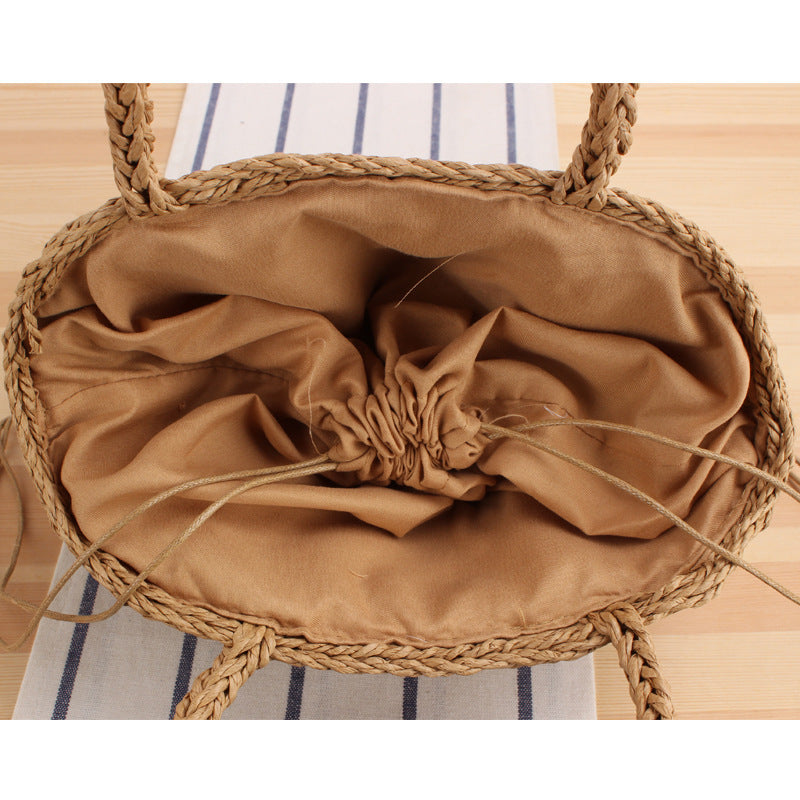 Braided shopping bag with reinforced bottom and long carrying handles Bowlift