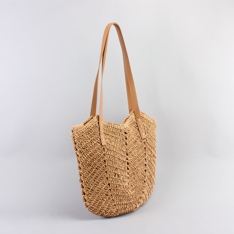 Casual bag made of handwoven straw with wide leather handles Bowlift
