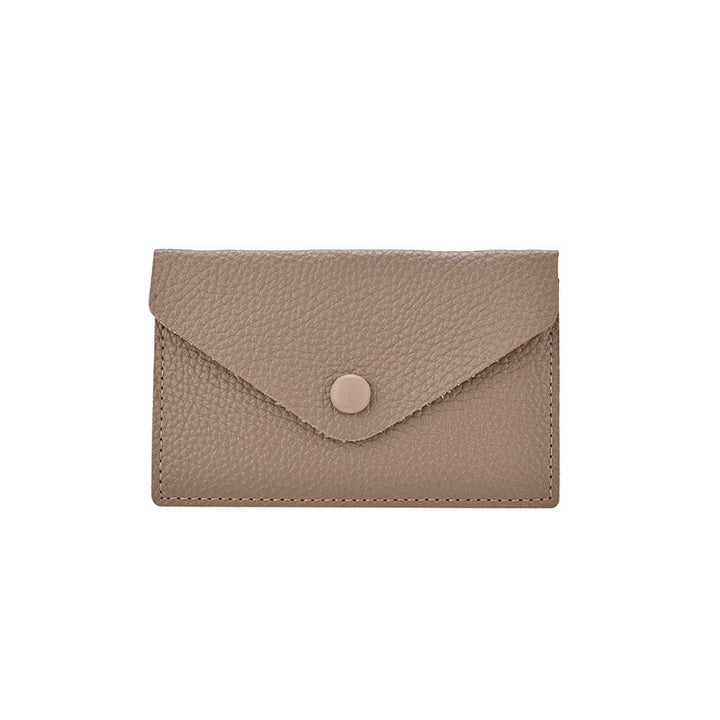 Compact Textured Leather Cardholder Bowlift