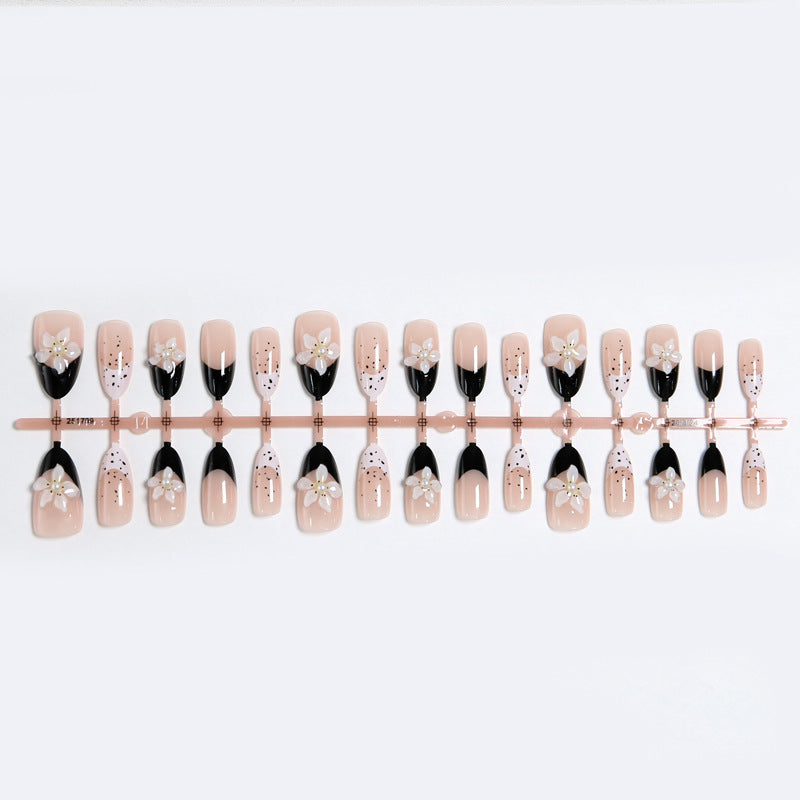Artful nail tips with floral embellishments Bowlift