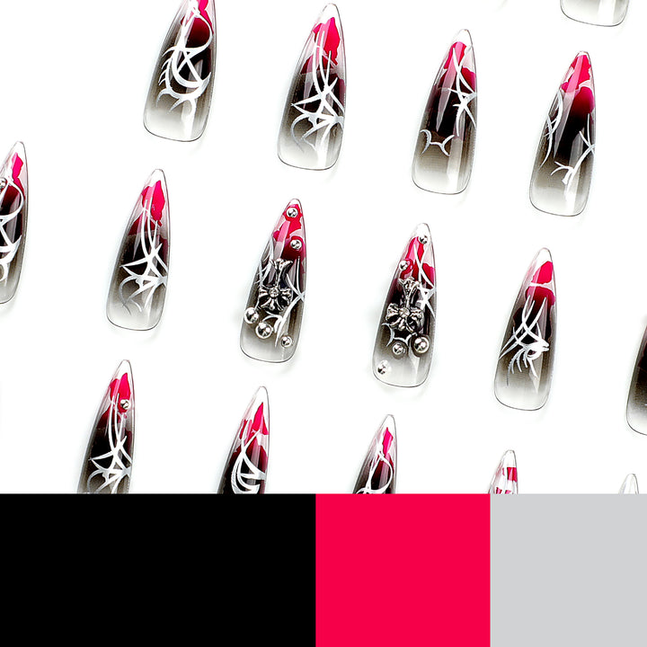 Artful stiletto nails with elegant decoration and modern accents Bowlift