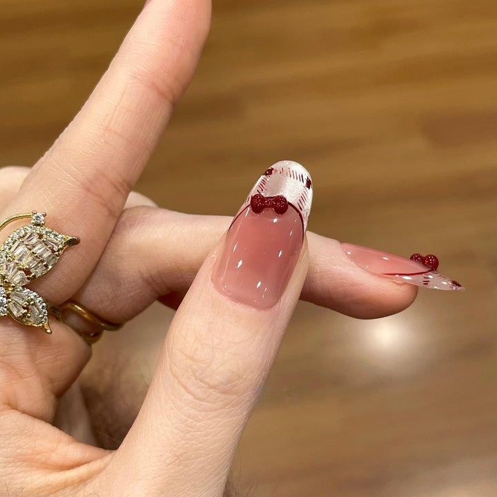 Artificial nails with playful Hello Kitty design Bowlift