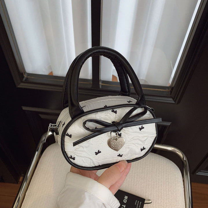 Quilted Mini Handbag with Heart Detail Bowlift