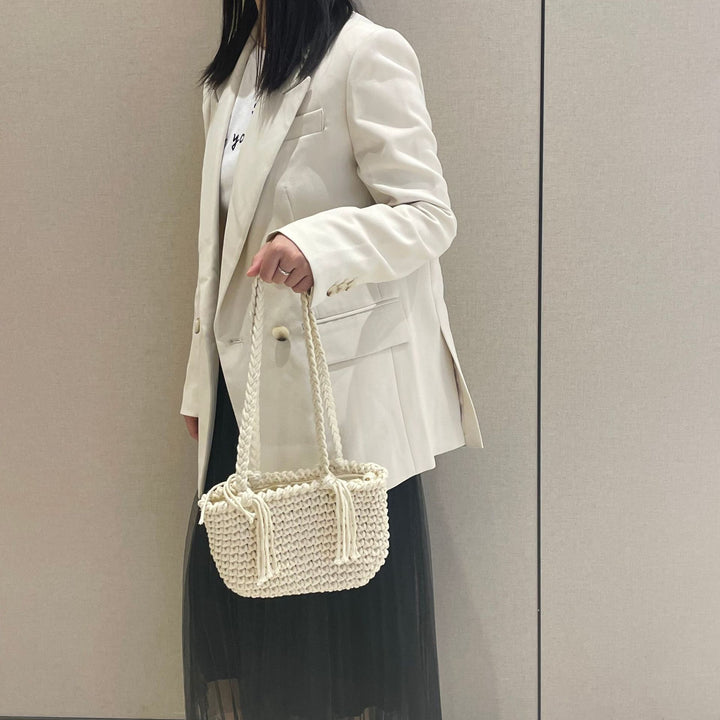 Hand-knotted shoulder bag with decorative pleating technique Bowlift