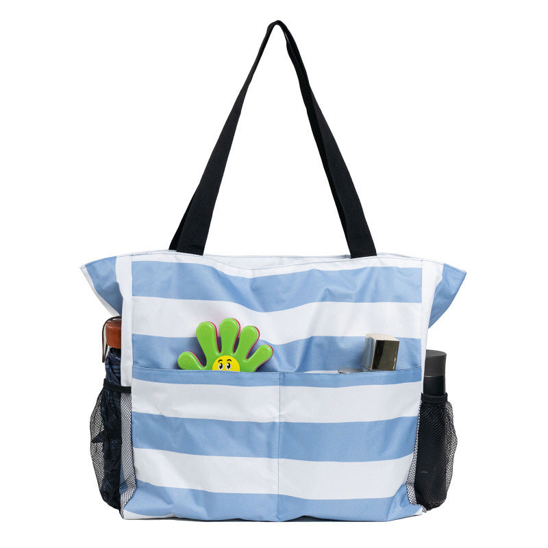Spacious beach bag with practical outer pockets Bowlift