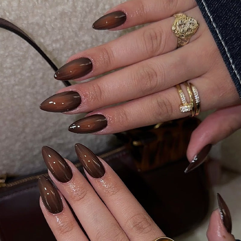 Acrylic nail set with luxurious color gradient and elegant lace accent Bowlift