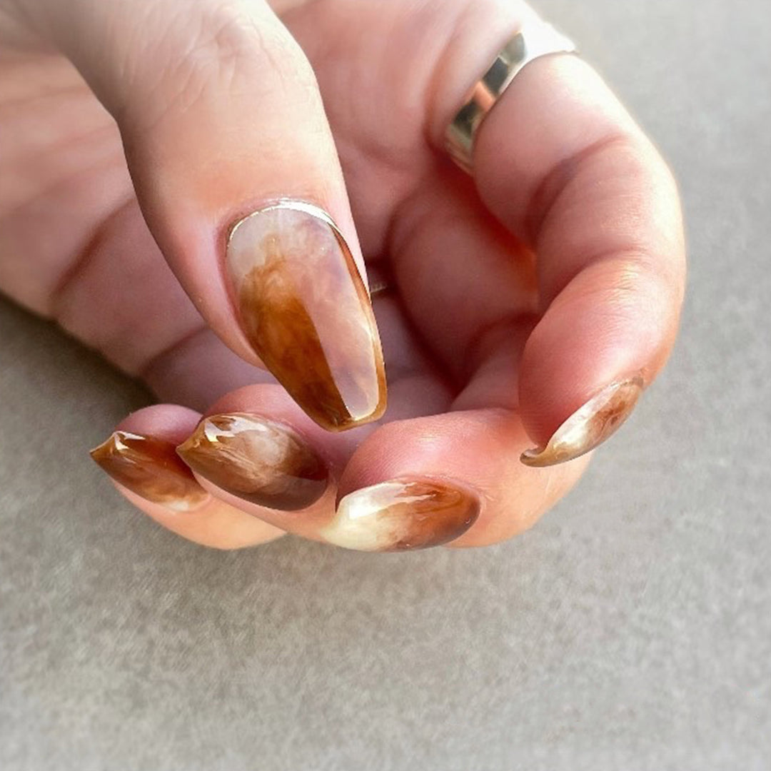 Artful nail extensions with an elegant leaf pattern Bowlift