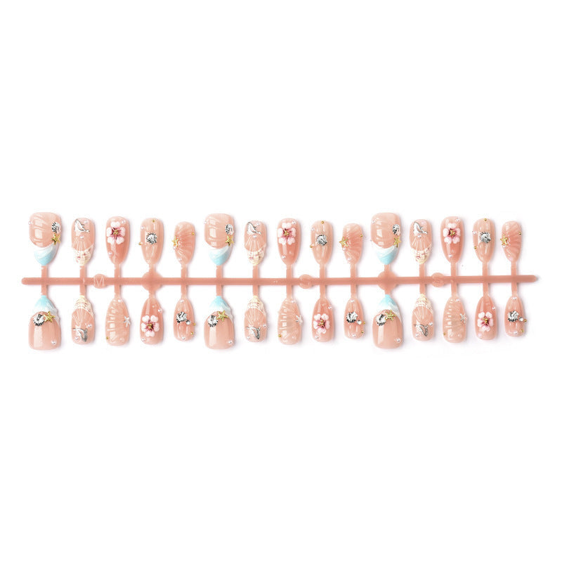 Acrylic nail set with filigree shell and flower decorations Bowlift