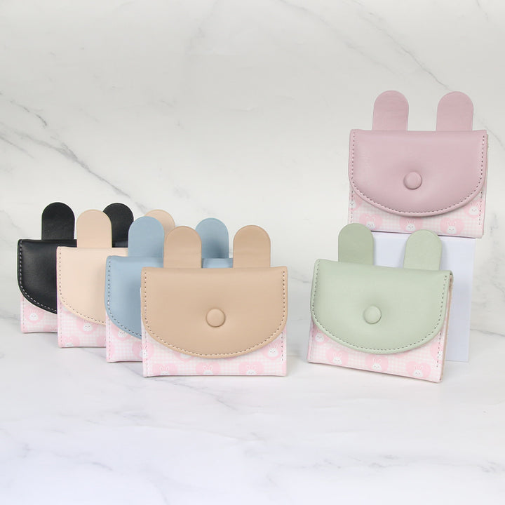 Compact rabbit-themed coin purse with snap closure and card slots Bowlift