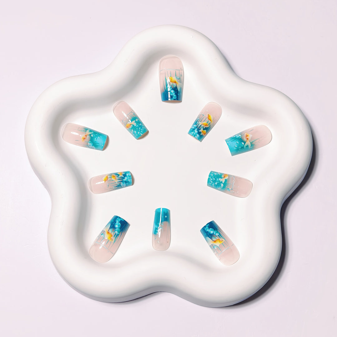 Creative art nails with maritime goldfish design Bowlift