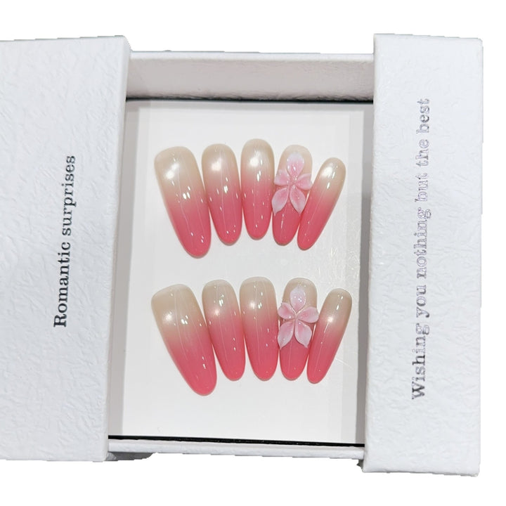 Artificial nails with romantic ombre design and floral accents Bowlift