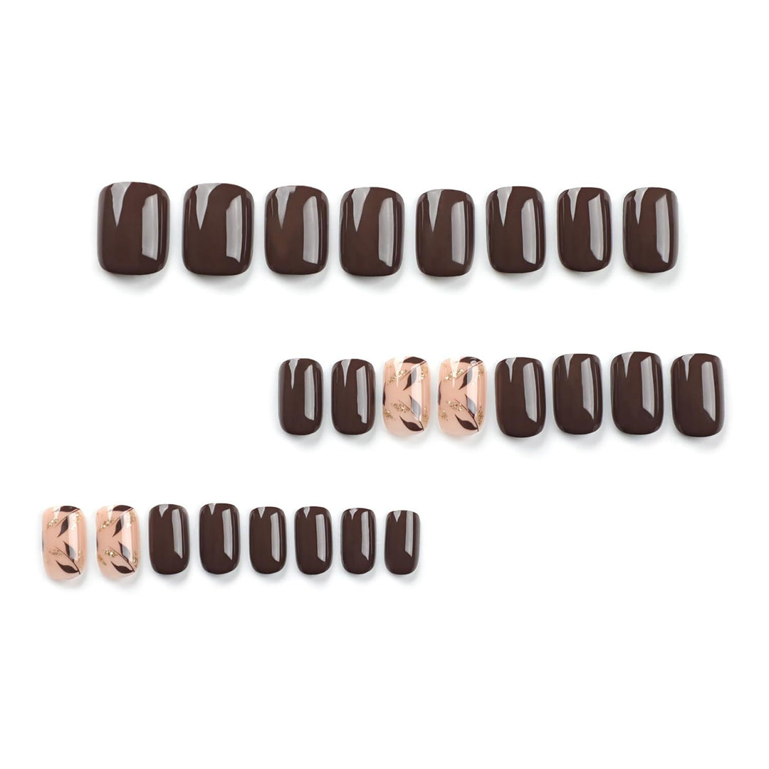 Nail set with elegant marble design and golden accents Bowlift