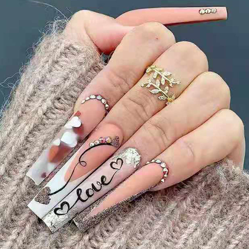 Acrylic nail set with romantic heart and glitter decorations Bowlift