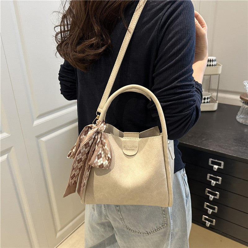 Elegant Bow Accent Handbag Bowlift