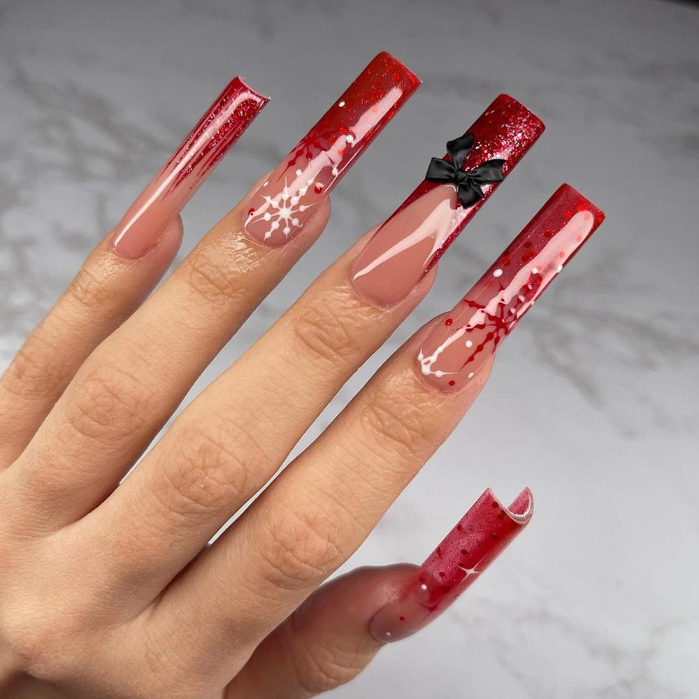 Artificial acrylic nails with glitter and Christmas design Bowlift