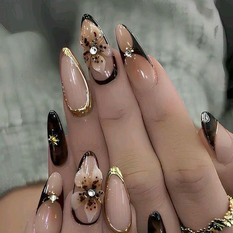 Artistic Press-On Nail Set with Elegant Floral and Abstract Designs Bowlift