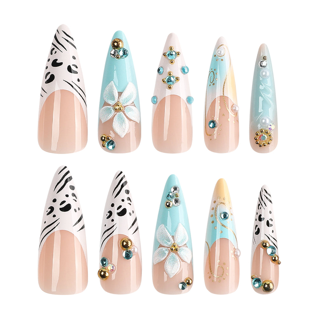 Artistic stiletto nails with floral accents and glitter details Bowlift