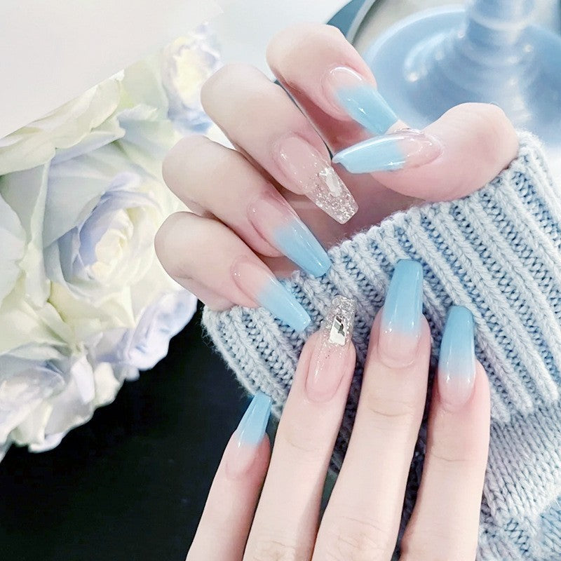 Nail set with elegant ombre and glitter accents Bowlift