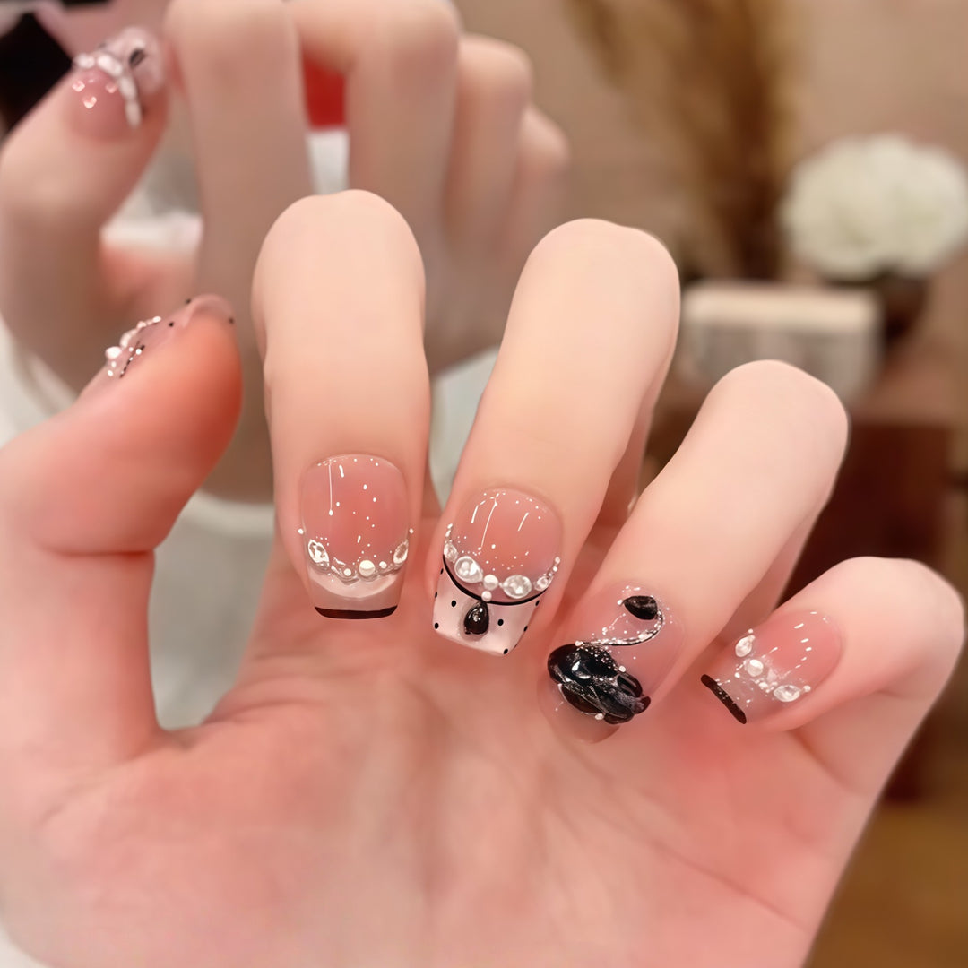 Elegant artificial nails with flower décor and glitter Bowlift