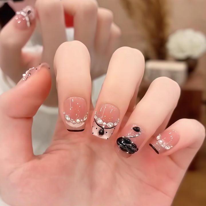 Elegant artificial nails with flower décor and glitter Bowlift