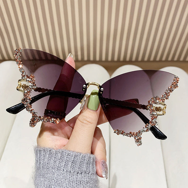 Women's extravagant sunglasses with sparkling butterfly design Bowlift
