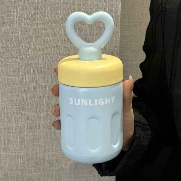 Women's practical drinking bottle with heart handle Bowlift