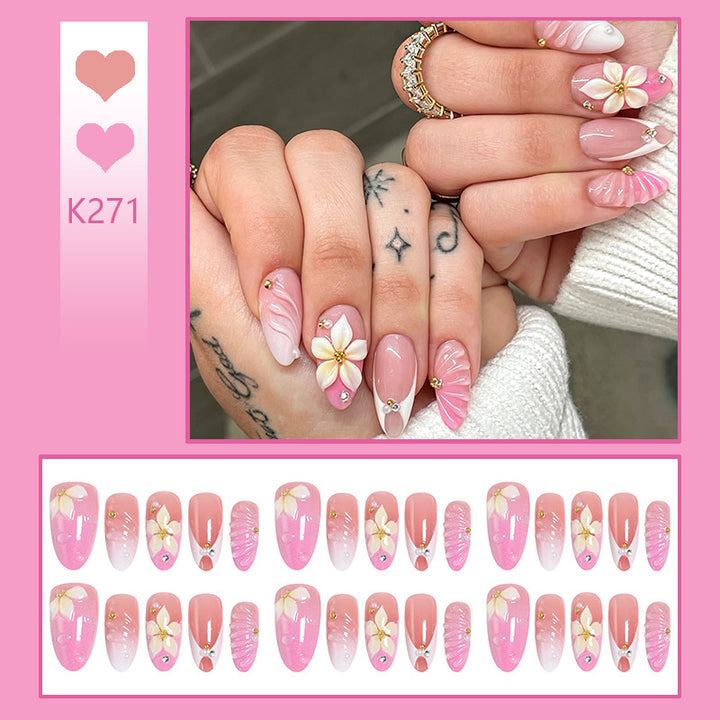 Nail art set with filigree flower patterns and sparkling accents Bowlift
