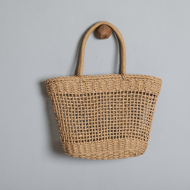 Basket bag made of natural raffia with sturdy carrying handles Bowlift