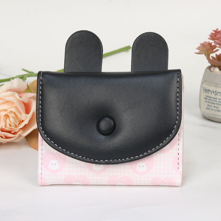 Compact rabbit-themed coin purse with snap closure and card slots Bowlift