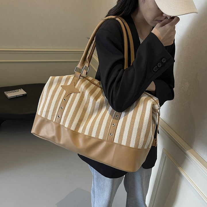 Elegant Sports Duffel Bag with Structured Outer Material and Sturdy Carry Straps Bowlift