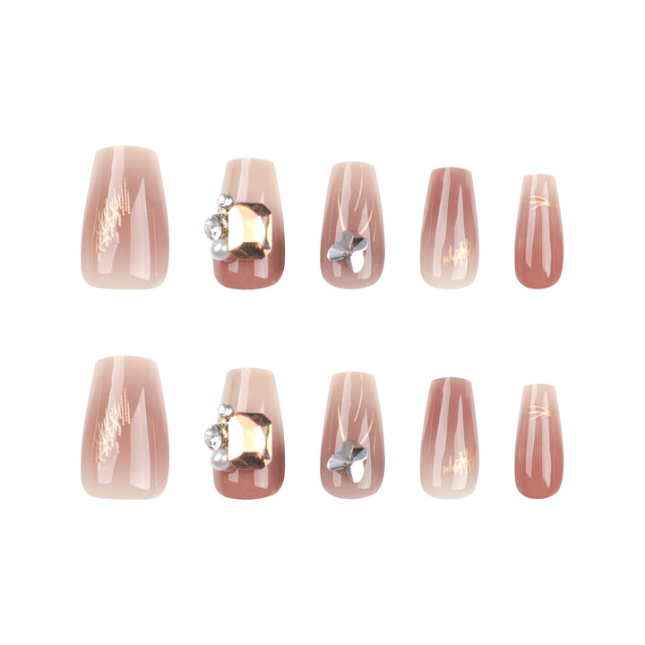Artificial nail art with elegant jewelry accents Bowlift