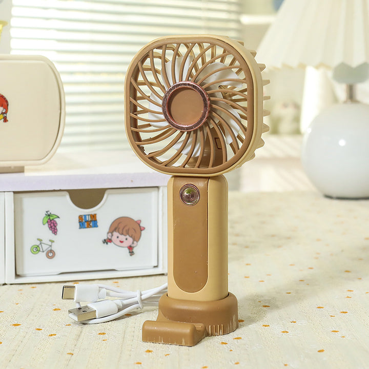 Women's portable mini hand fan with USB charging function and flexibly adjustable tilt angle Bowlift
