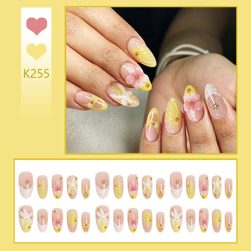 Artificial nails with floral glitter pattern Bowlift