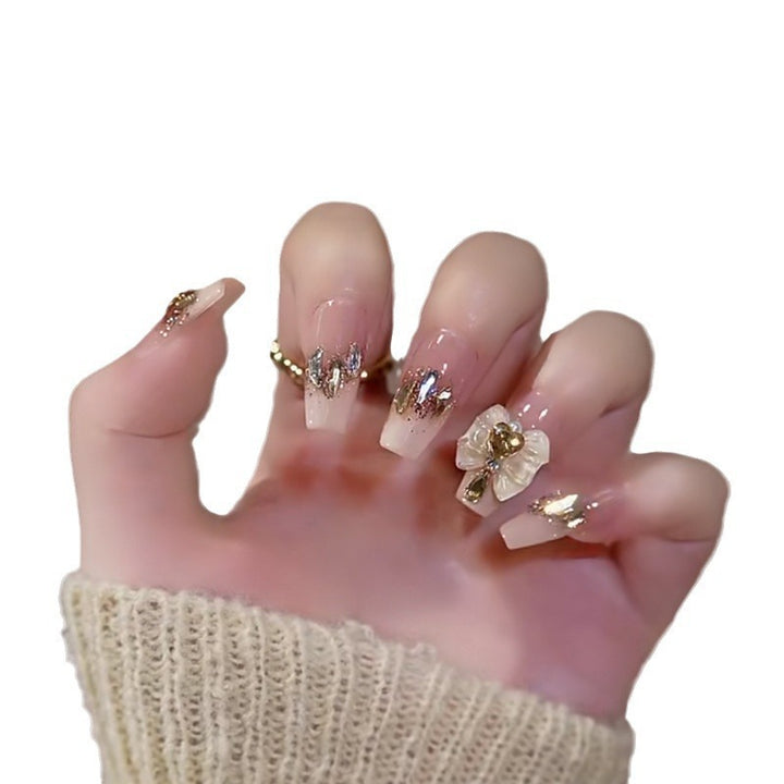 Artificial nails with romantic heart design and glitter coating Bowlift