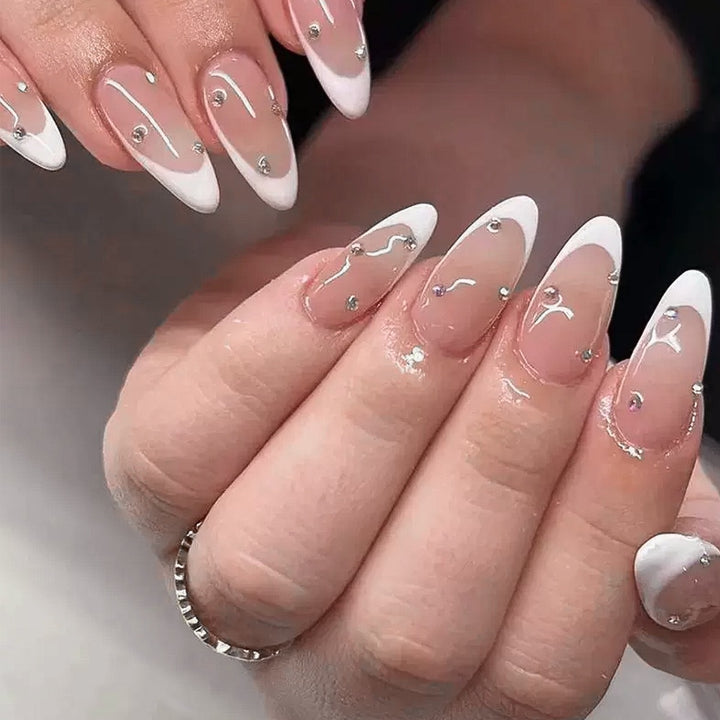 Elegant French Nail Art with Rhinestone Decorations Bowlift