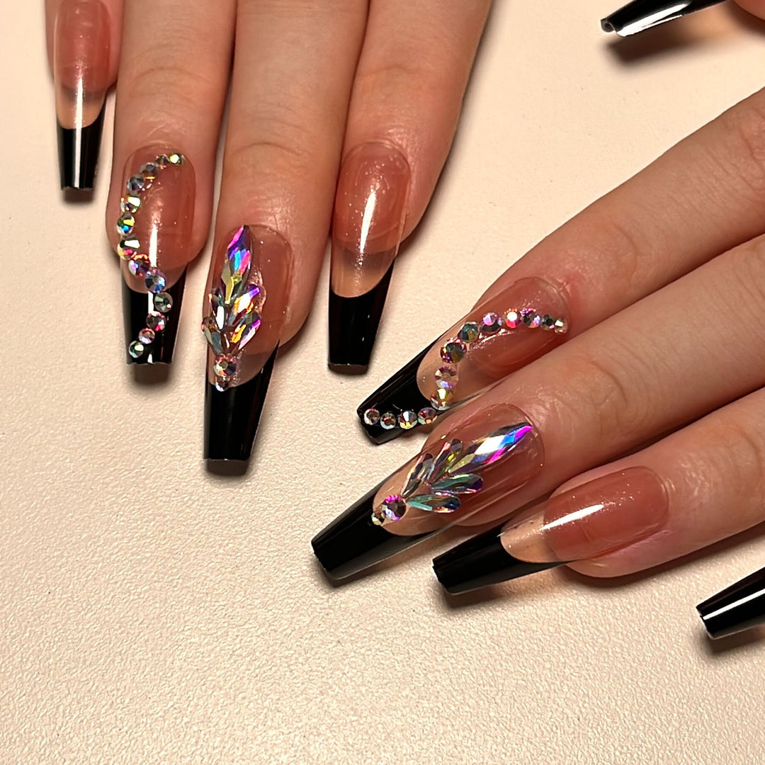 Artistic stiletto nails with glitter embellishments Bowlift