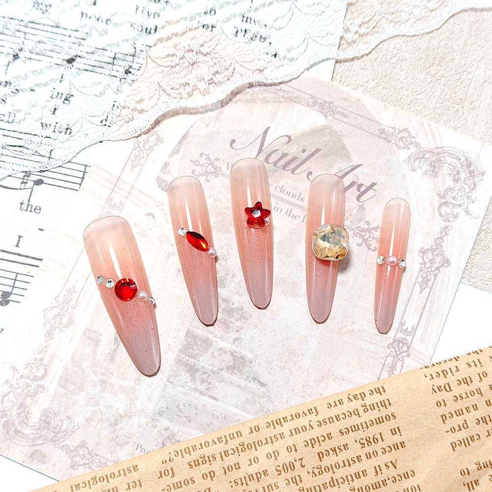 Sparkling artificial nails with decorative rhinestones Bowlift