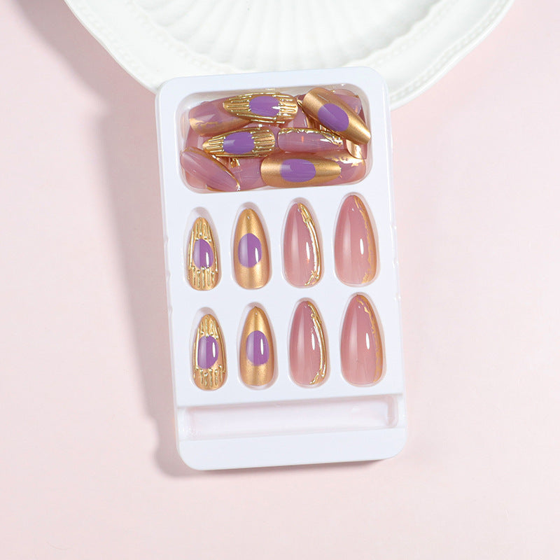 Artistic Press-On Nail Set with Gold and Purple Accents Bowlift