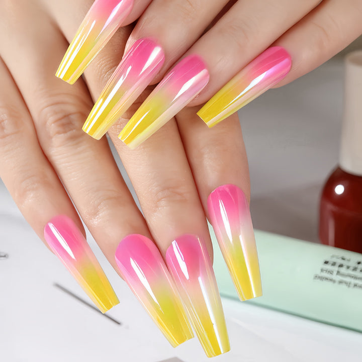 Artificial nail tips in modern ombre design Bowlift
