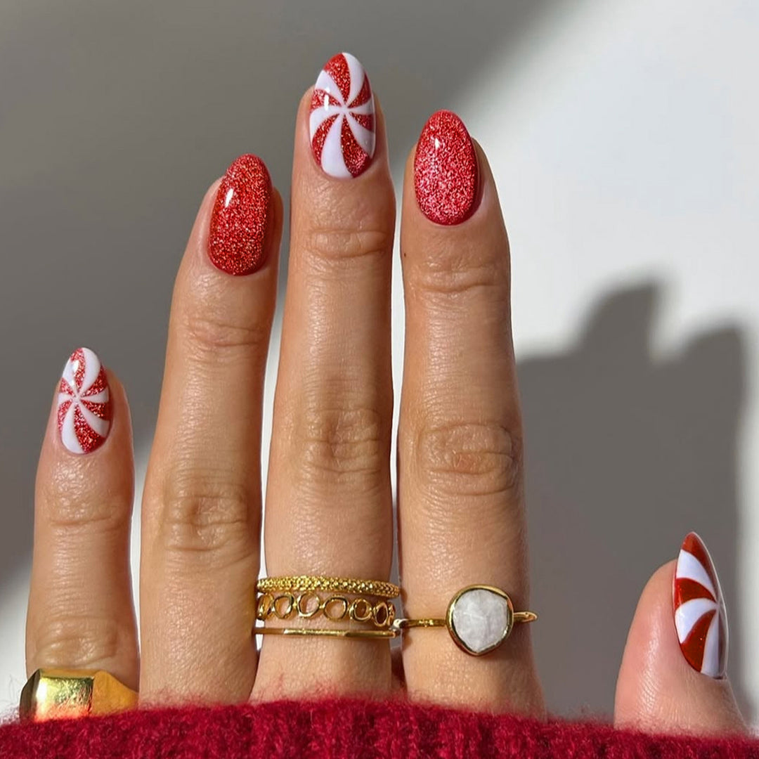 Art nail set with festive candy cane design Bowlift