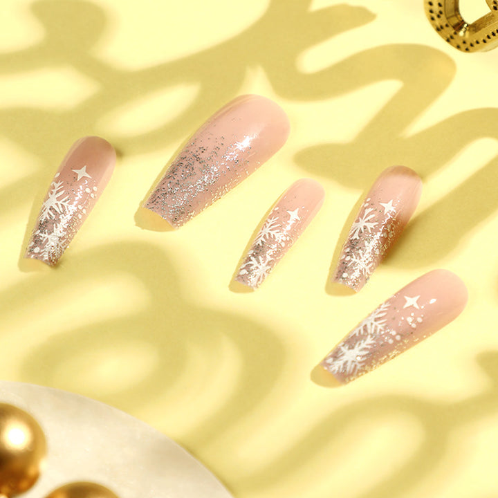 Artful nail art in winter design with glitter and snowflakes Bowlift